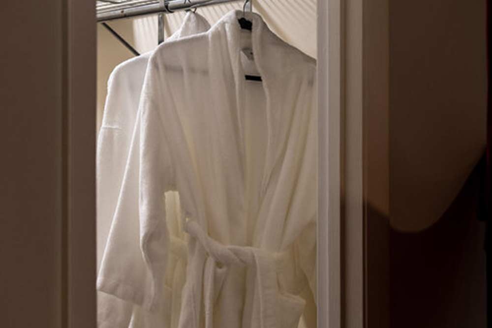 <p><em>Cozy Robes</em></p>
<p>Wonderful amenities like massage oils and fluffy robes help make this couples retreat extra special.</p>
